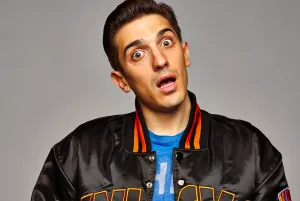 Andrew Schulz performing at Live at the Barbershop