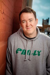 Shane Gillis performing at Live at the Barbershop